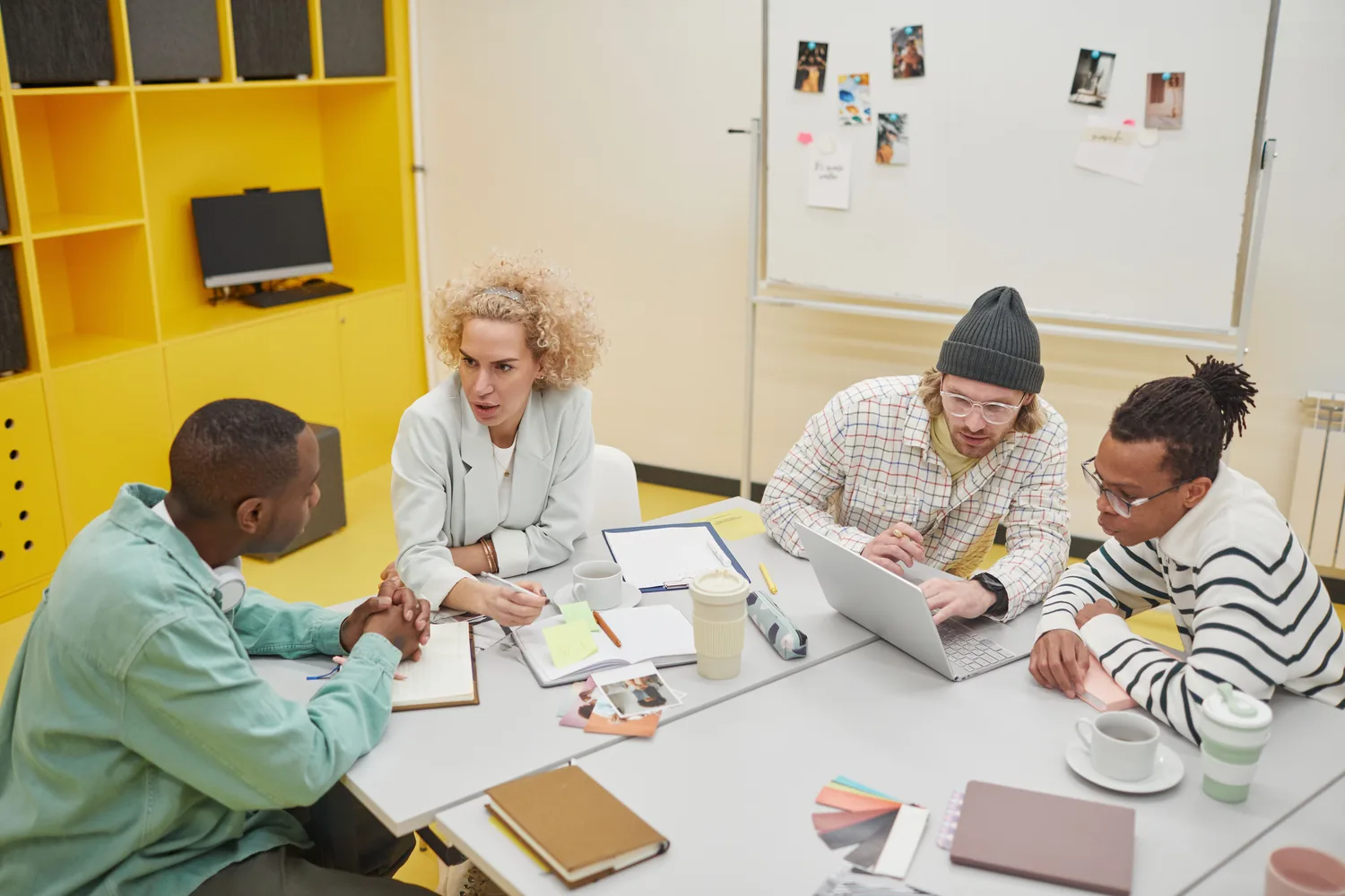 A project team sharing ideas during a practical workshop