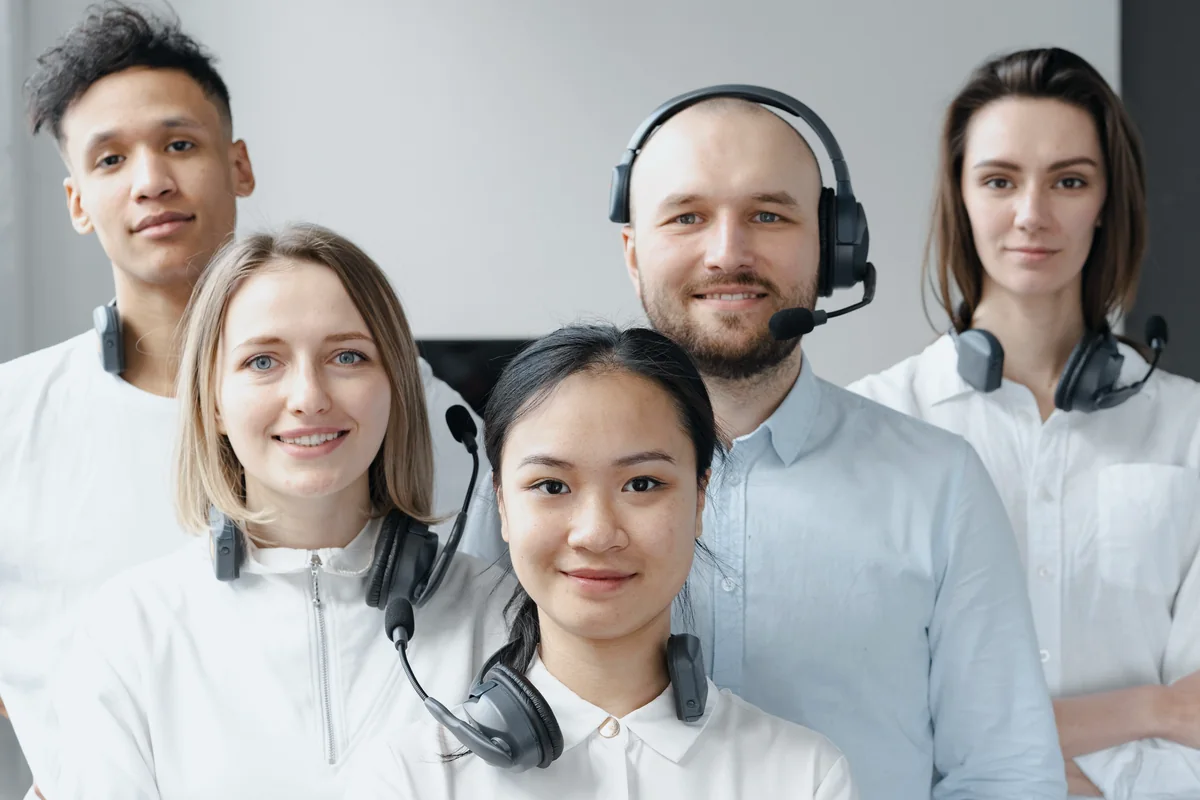 Telecommunications service team coordinating customer notifications and calls