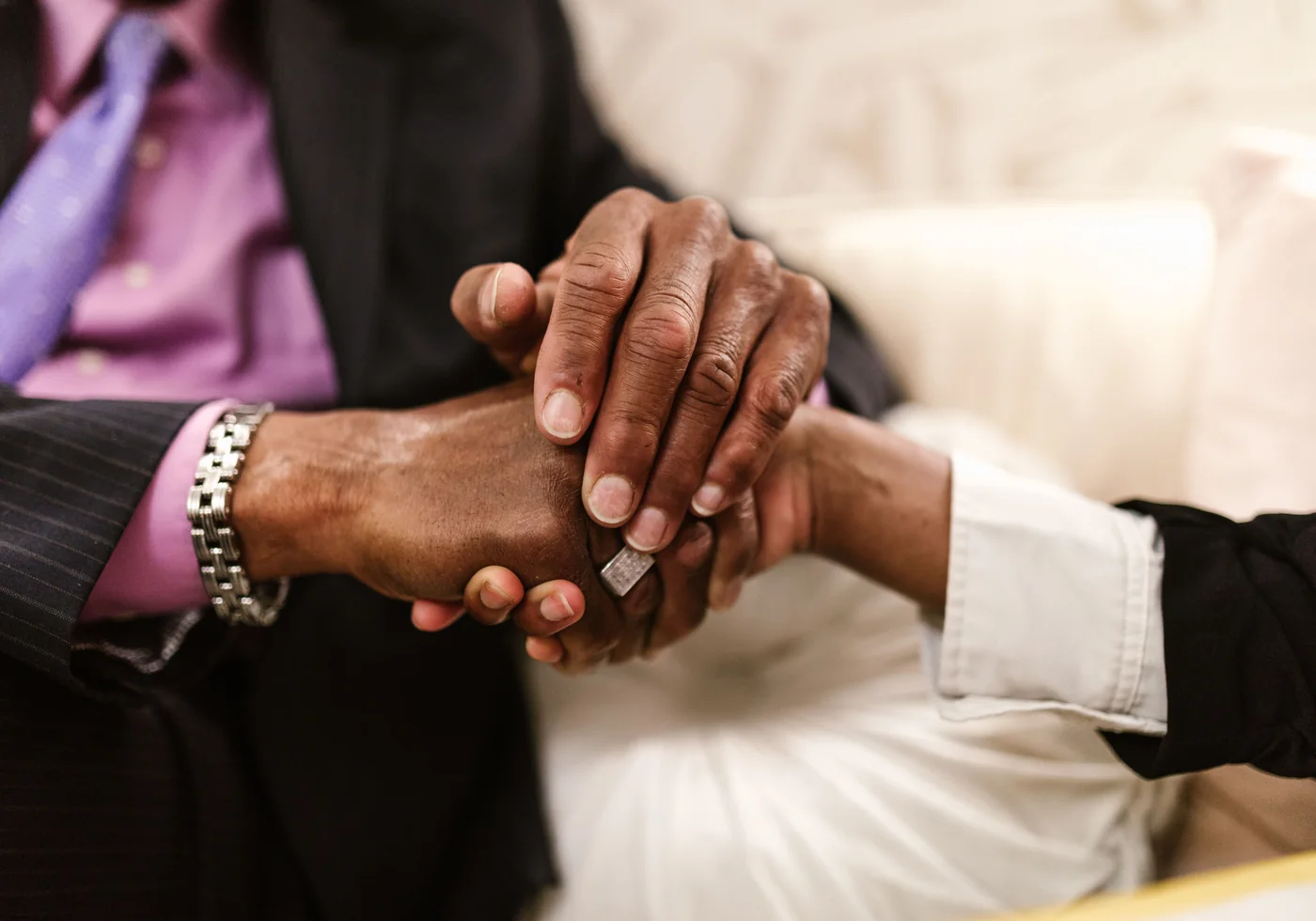 Close-up of two business professionals sealing an agreement with a handshake