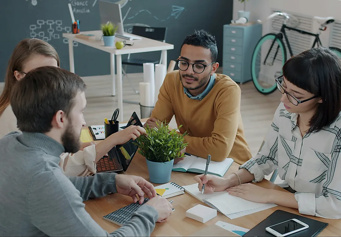 Professional team working through the build stage of a digital-service programme